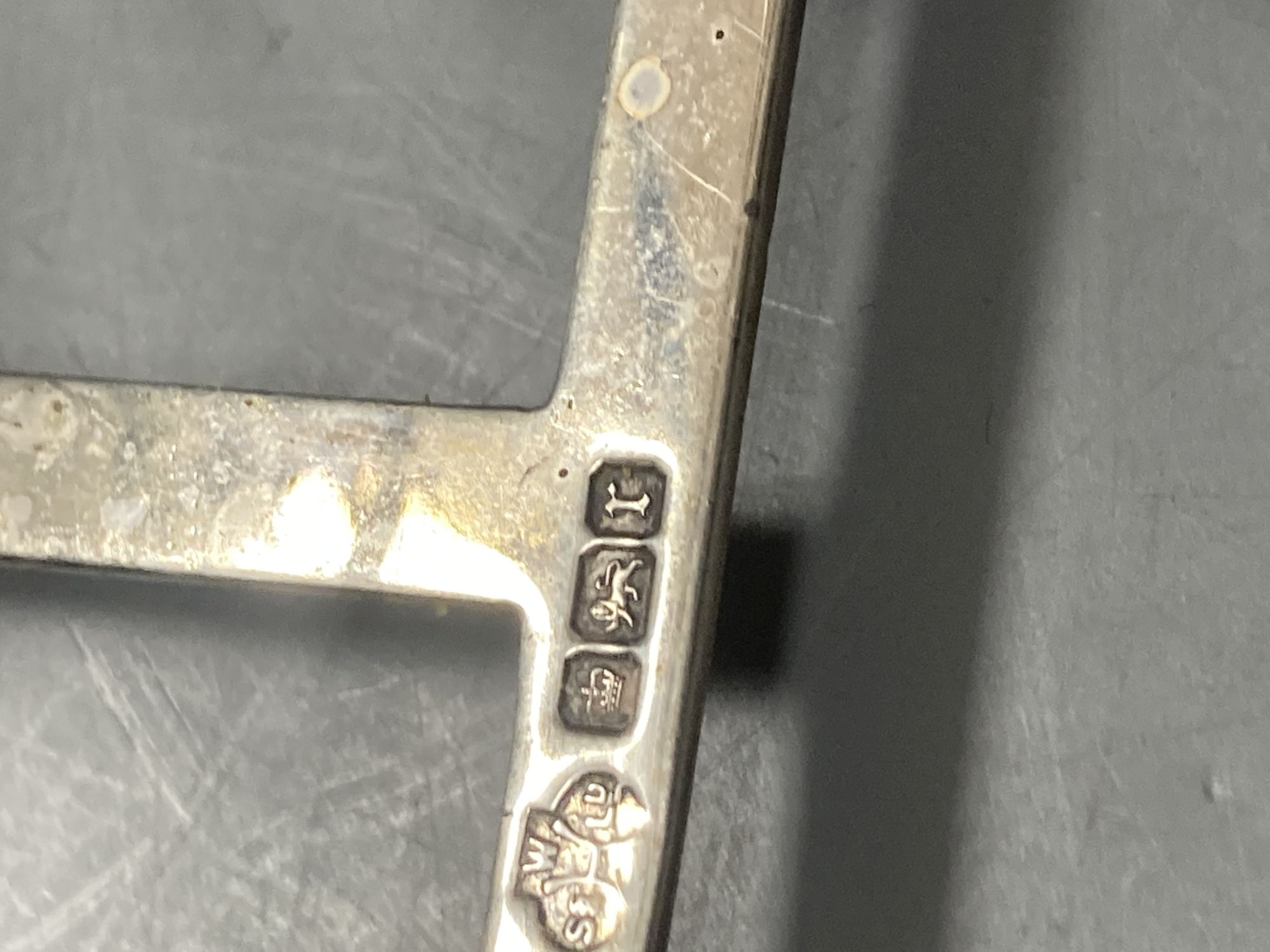 An Edwardian silver seven bar toastrack, William Hutton & Sons, Sheffield, 1909, a.f., a pair of George III silver salts etc.